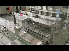 Maschine zur Befüllung und Abdichtung von Popcorn-Plastikbehältern